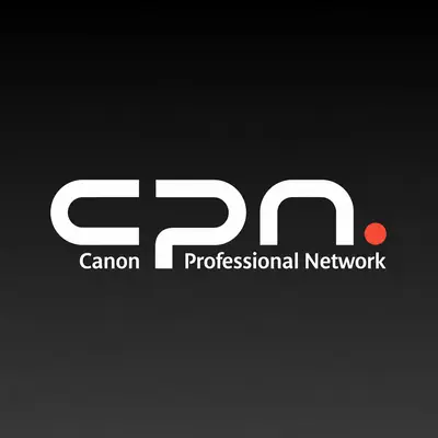 A clean, graphic logo centred on a dark charcoal gradient background. It features the bold, whitestylised acronym “CPN“” with “Canon Professional Network” printed directly underneath in a sans-serif font, accompanied by a distinct red dot on the right side.