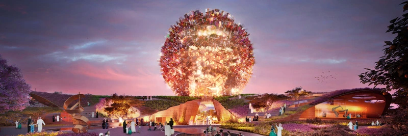 Architectural rendering of Ilmi Center at sunset, featuring a glowing spherical structure at the center of a landscaped cultural park filled with visitors.
