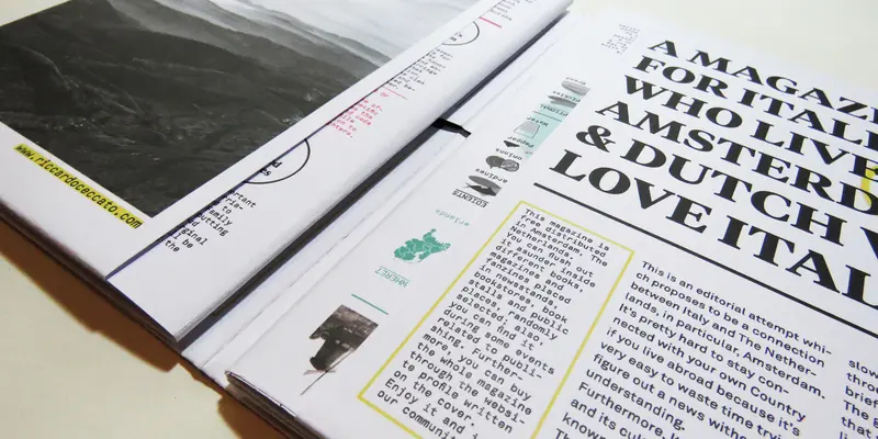 An open spread of a magazine laid flat on a table. The right page features bold, black typography stating “A magazine for Italians who live in Amsterdam & Dutch who love Italy,” alongside columns of article text and a diagram.