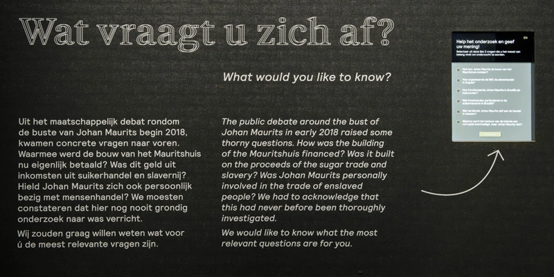 Interactive panel titled “Wat vraagt u zich af?” (“What would you like to know?”) invites visitors to reflect on the legacy of Johan Maurits and colonial history, featuring a mix of Dutch and English explanatory text and survey questions.
